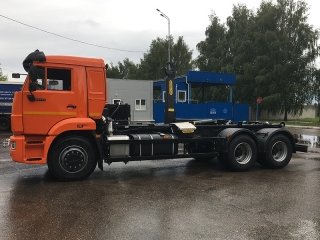 Крюковый погрузчик КАМАЗ 65115-3094-48 с гидроупорами с КМУ Palfinger PH T15